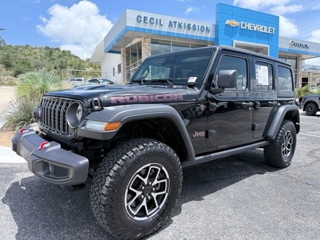 2026 Jeep Wrangler Rubicon in Black — front three-quarter view