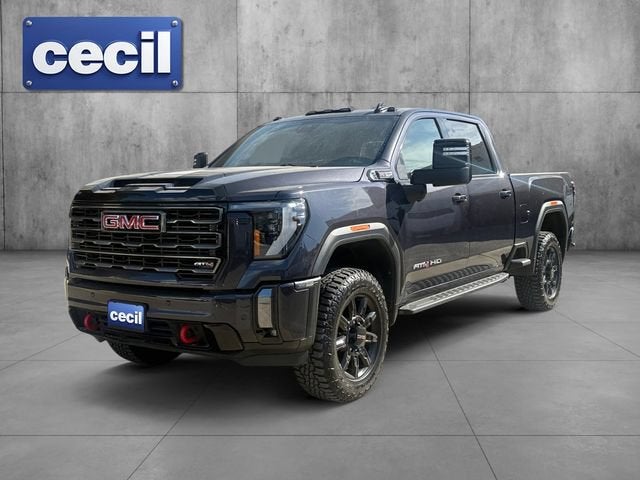 2024 GMC Sierra 2500 HD AT4 in Titanium Rush Metallic — front three-quarter view