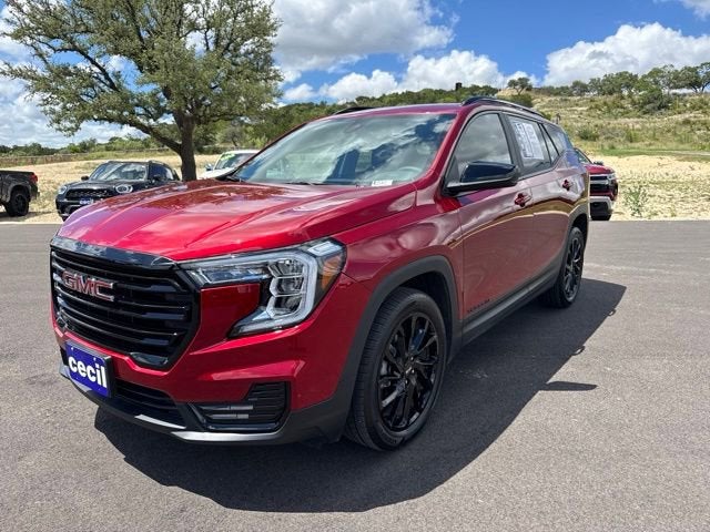 2024 GMC Terrain SLE in Volcanic Red Tintcoat — front three-quarter view