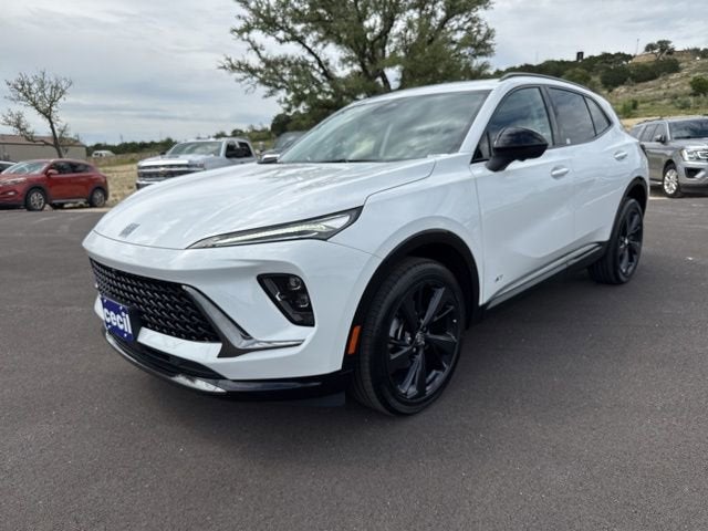 2026 Buick Envision Sport Touring in Summit White — front three-quarter view
